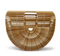 Polished bamboo clamshell backpack bag in natural finish with crossbody strap – holiday beach bag