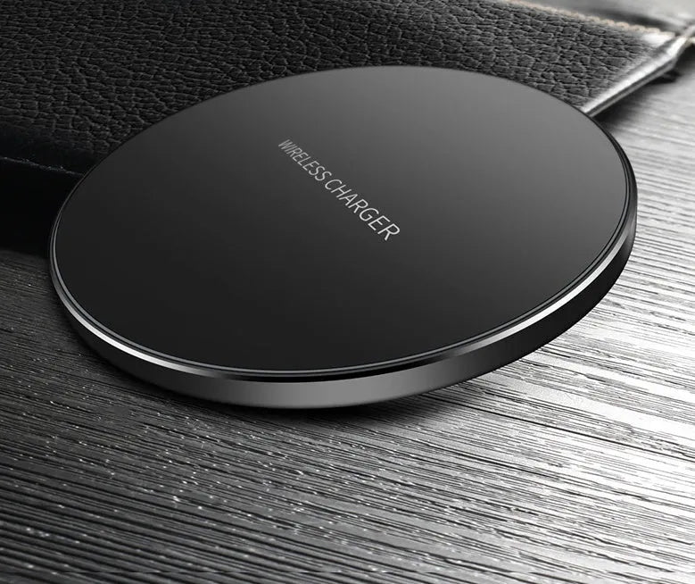 Black 98mm wireless charging pad with copper coil for 9V fast charging iPhone and Samsung