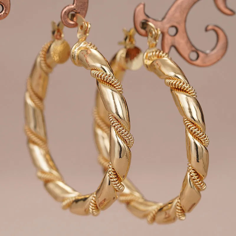 Geometric copper clip-on earrings with ring and line design elements