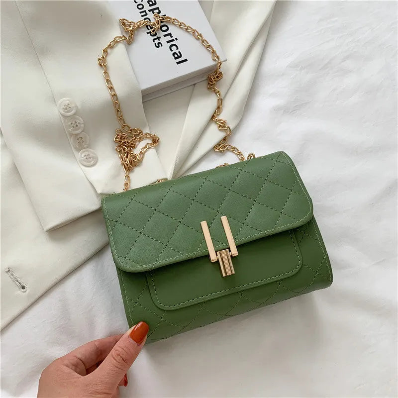 Women's crossbody bag with diamond lattice chain strap in black, white or green minimalist design