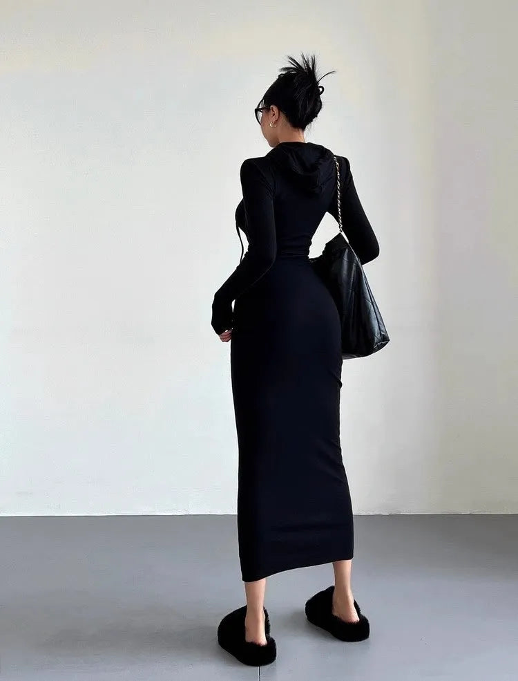 Women's grey hooded sheath dress with long sleeves and a high waist.