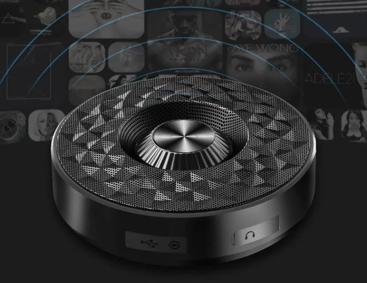 Compact cylindrical Bluetooth speaker in black, orange or silvery white colour with wireless connectivity
