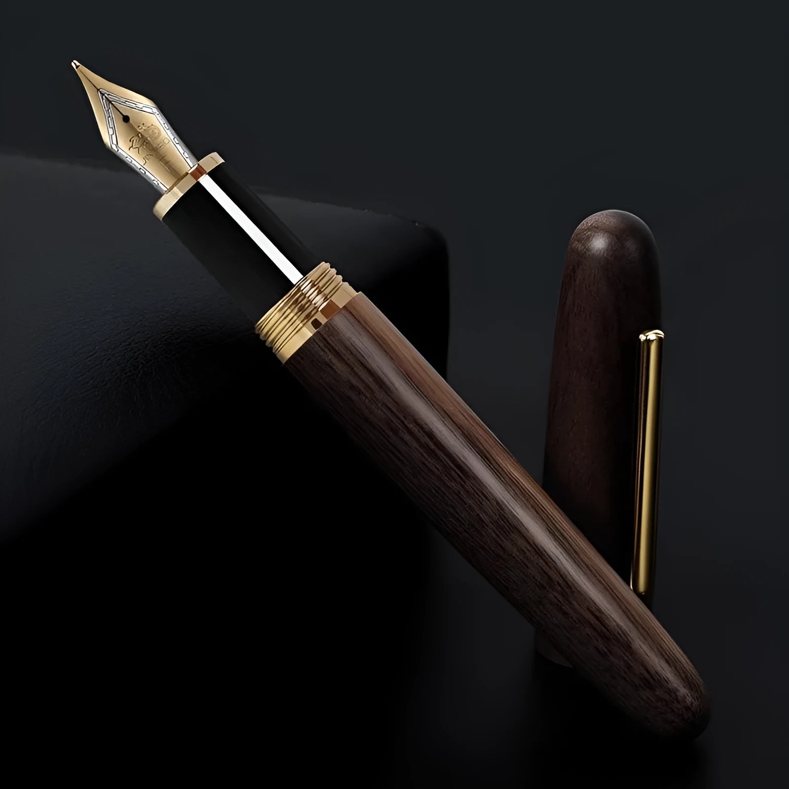 Wooden fountain pen with rotating cap shown in various wood finishes including rosewood and ebony.