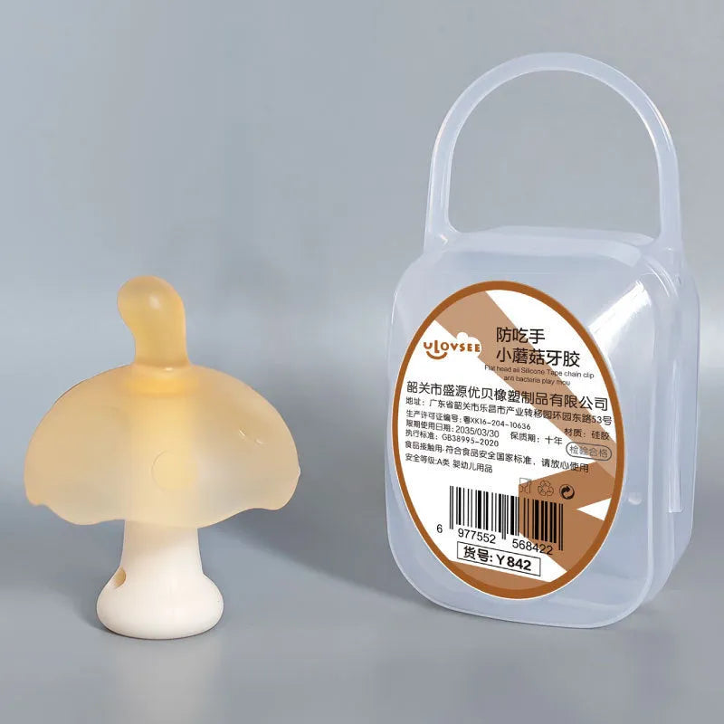 Small latex mushroom gum silicone toy in a transparent box with a chain.