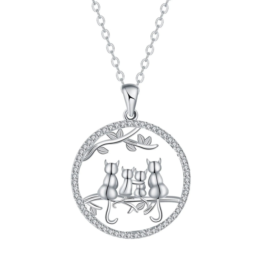 Copper necklace with a four-cat pendant on a textured cross chain, electroplated finish.