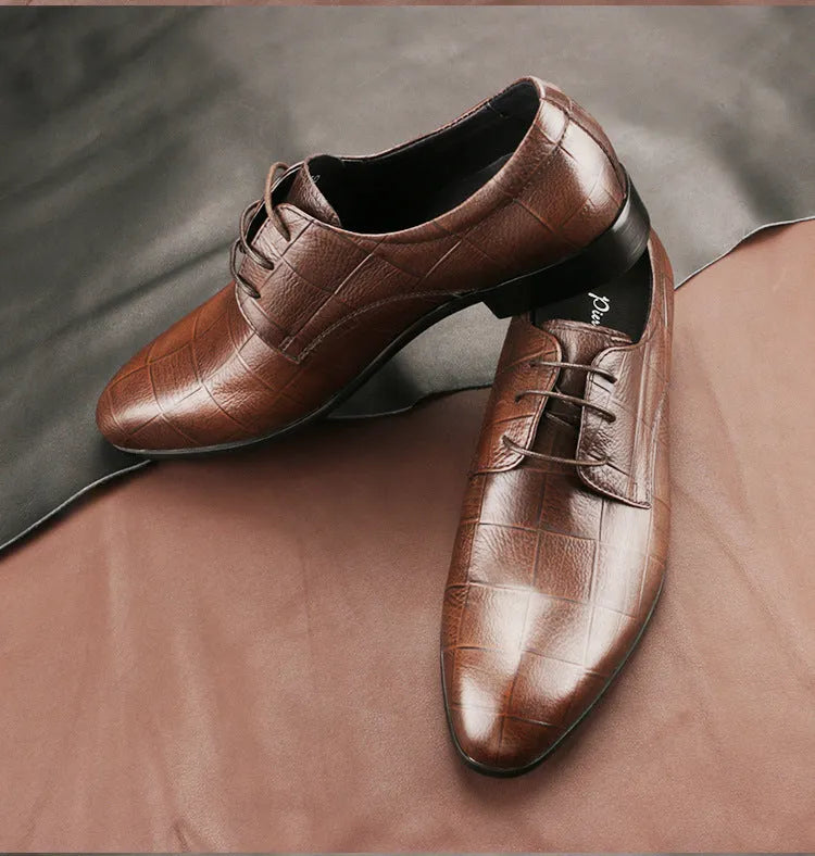 Men's black checkered leather derby shoes with pointed toe and rubber sole