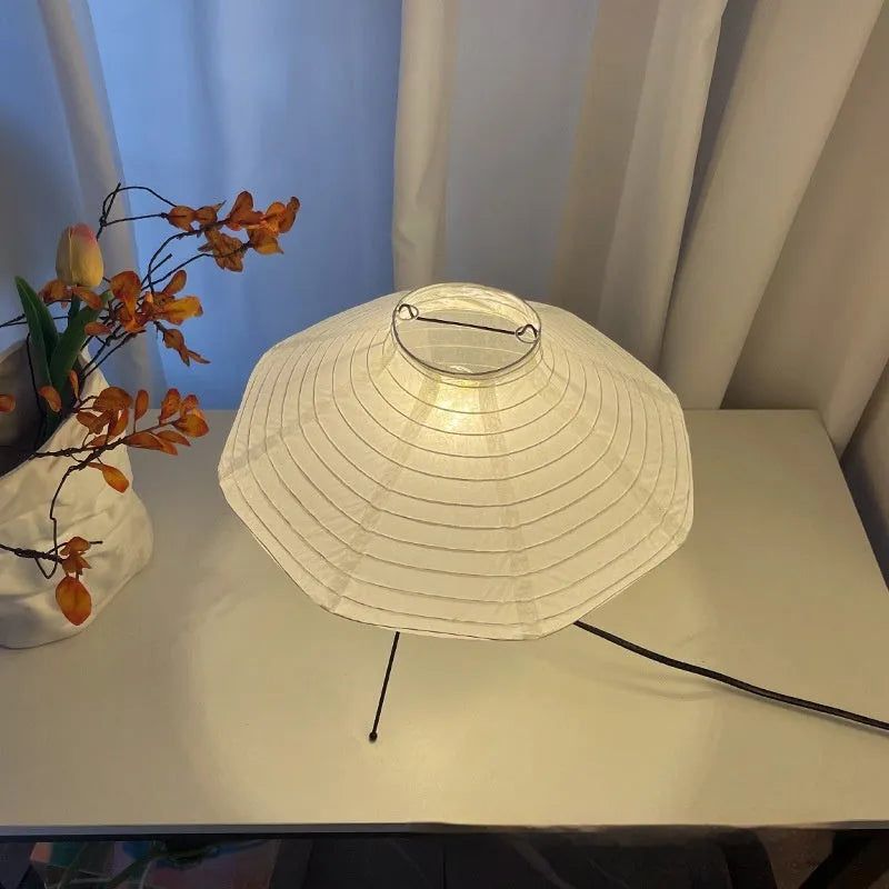 Japanese-style rice paper vertical table lamp with 3-colour light, 30cm diameter 32cm height, on a bedside table