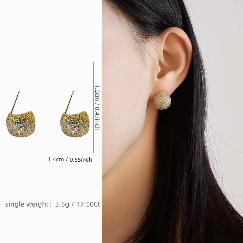Little Golden Beans geometric drop earrings with full diamond-cut crystal surface and spherical elements
