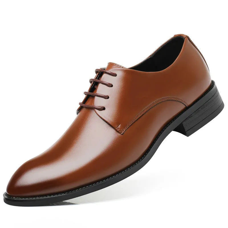 Men's black leather dress shoes with low heel and front strap on white background
