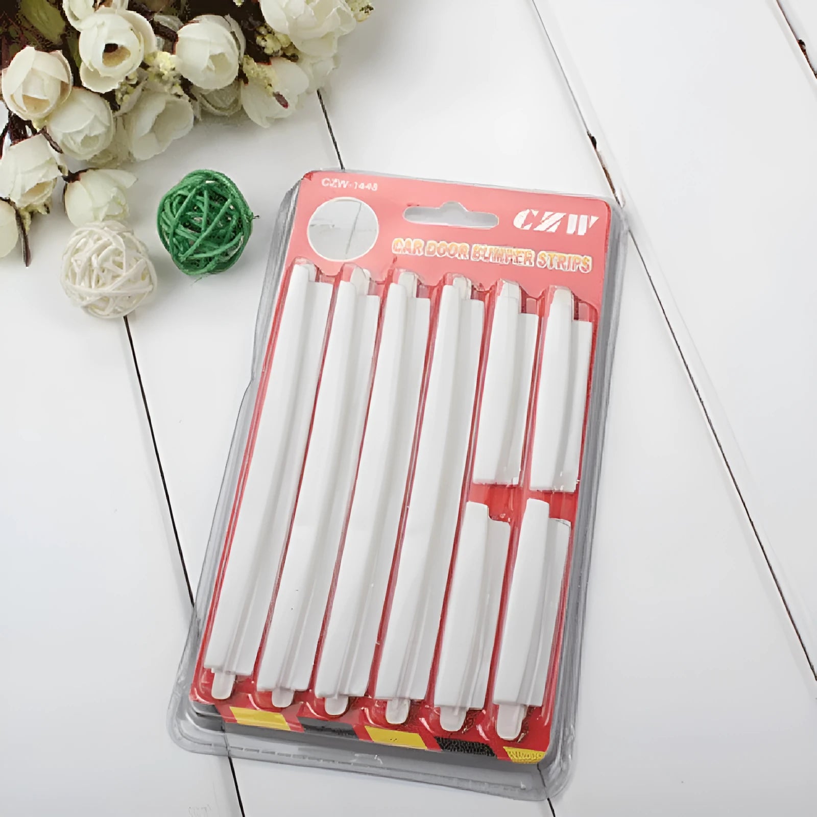 White plastic car door edge anti-collision strip protector set.