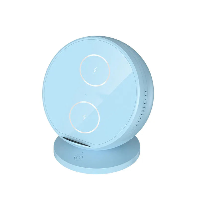 Black multifunctional mobile phone wireless charger holder with Bluetooth speaker, showing phone in cradle.