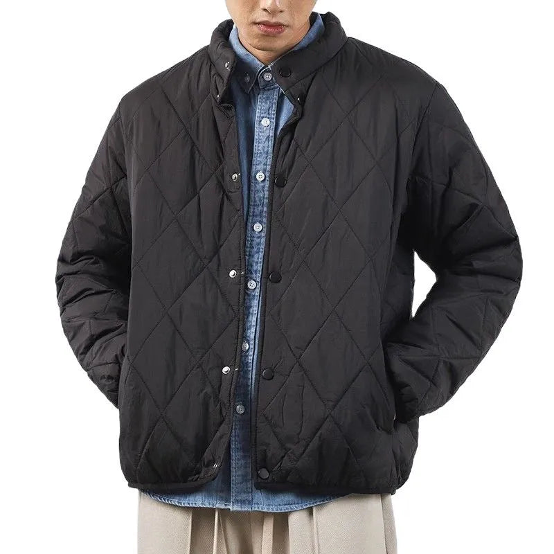 Men's black diamond lattice patterned winter jacket showing lengthened design and medium thickness padding