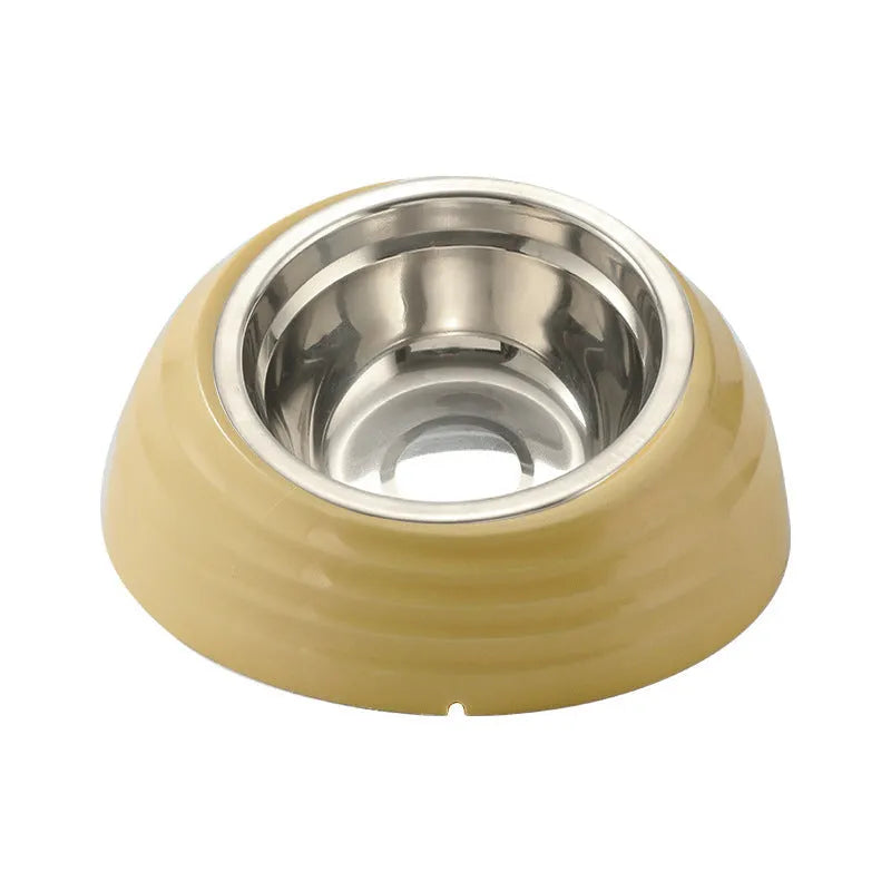 Stainless steel cat bowl in a beige plastic base