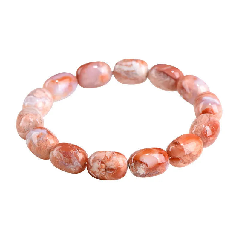 Natural cherry agate barrel bead bracelet with Ruyi decoration on white background