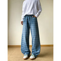 Retro blue plaid wide-leg skinny jeans with mid waist and zip fly, front view, blue denim fabric