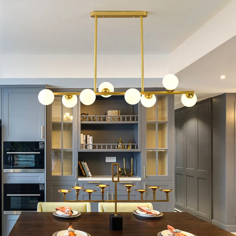 Modern minimalist glass bubble ball chandelier with black iron body and clear glass shades in a Nordic style