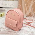 Women's compact black PU bag worn as both a shoulder bag and a small backpack.