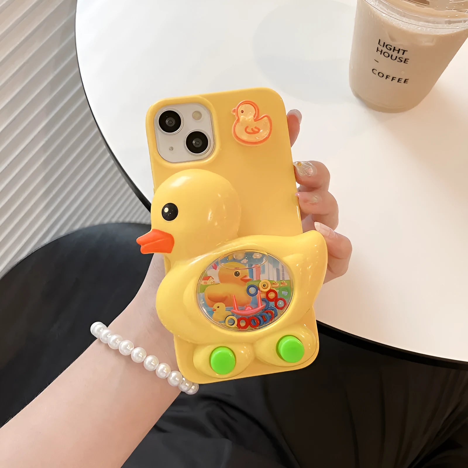 Yellow silicone iPhone case with 3D quicksand yellow duck design for anti drop protection