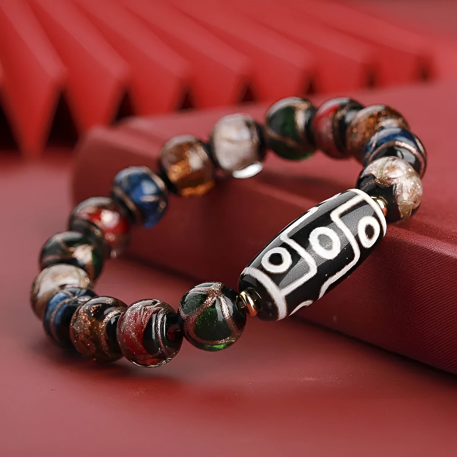 Handcrafted Chinese coloured glaze bracelet with snake year beads in auspicious patterns
