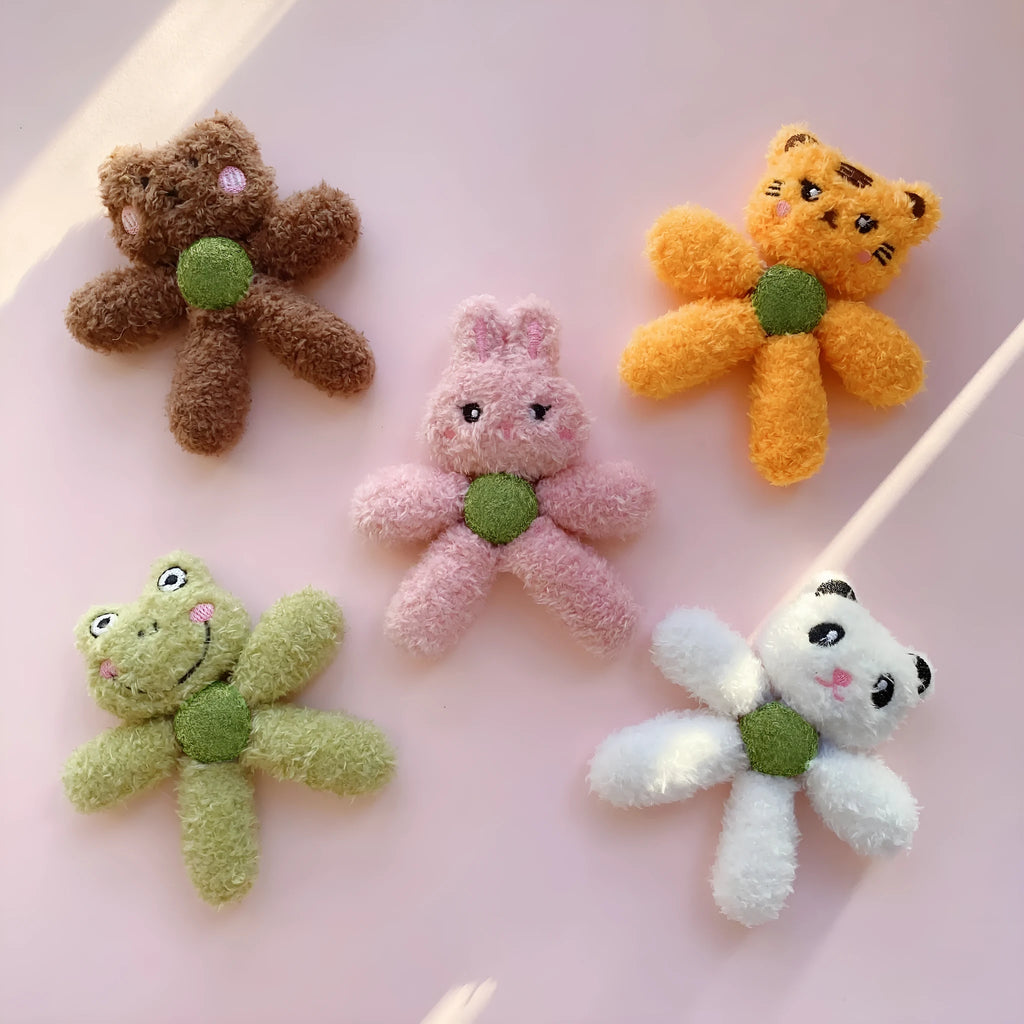 Catnip chewing ball with edible stuffing for dental cleaning in animal designs