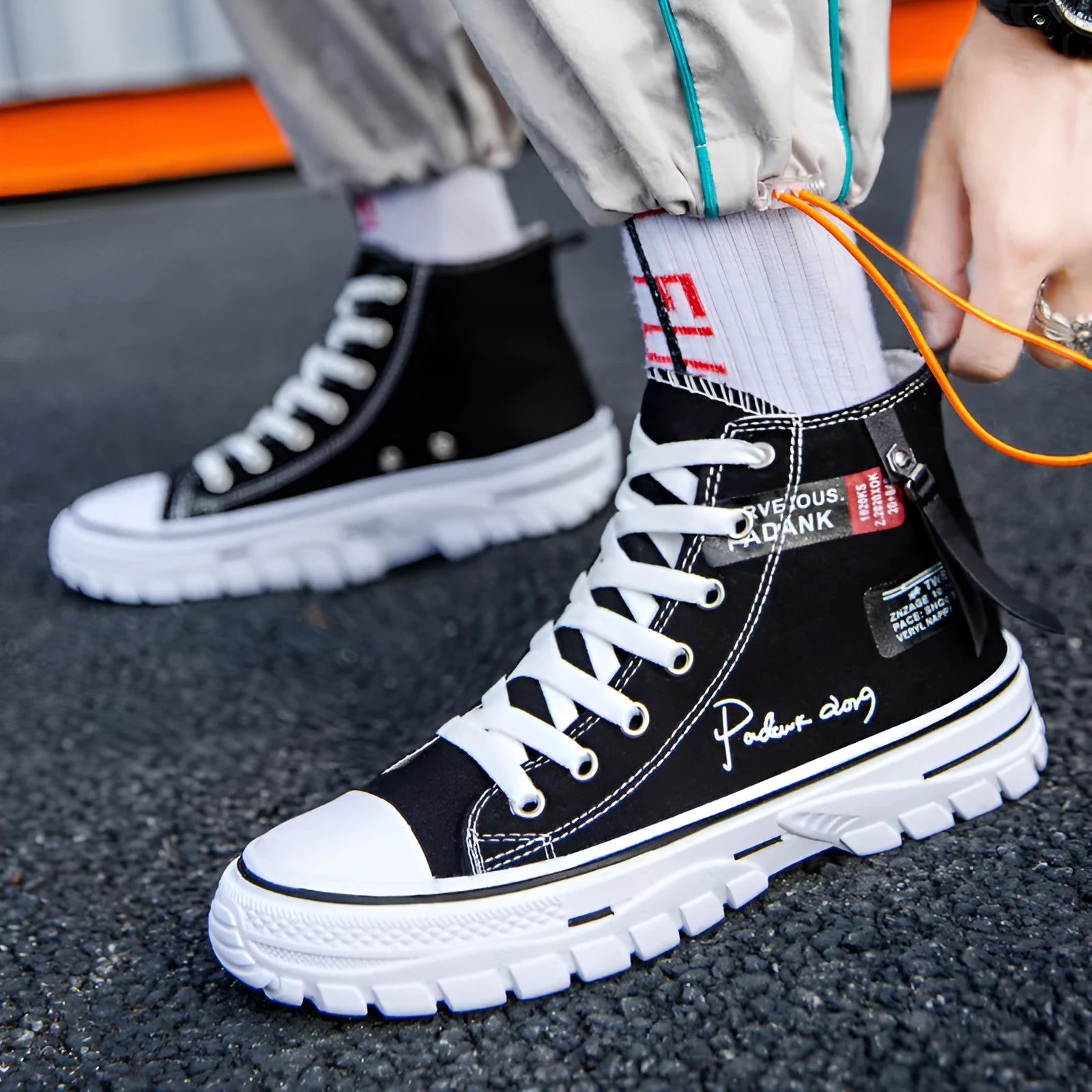 Men's casual canvas high top lace-up shoes in black with letter print pattern, round toe, and front laces