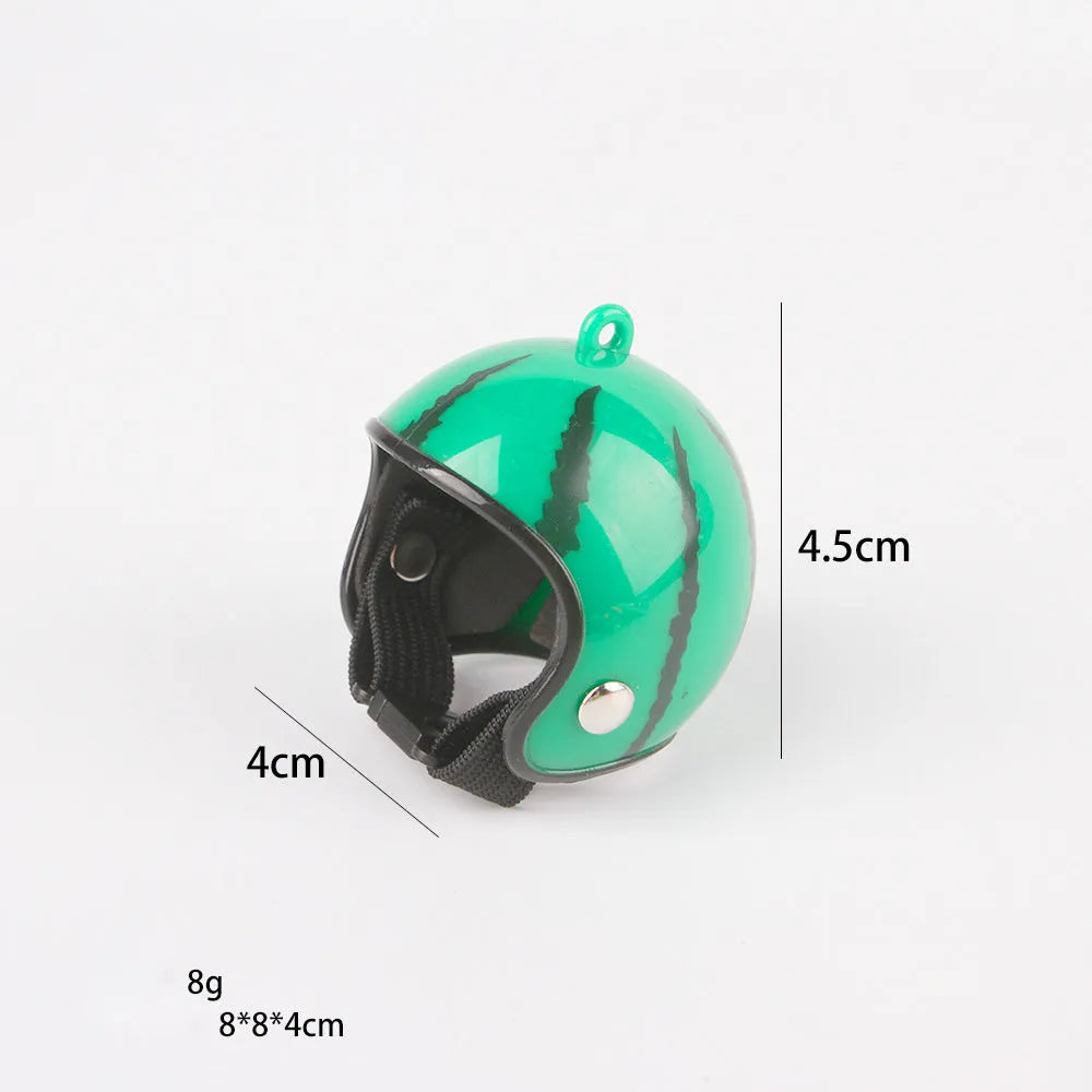 Small adjustable plastic safety helmet for a chicken or bird, shown in a fun design.