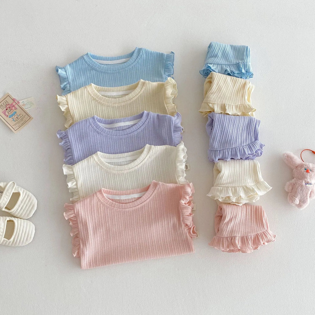 Baby girl two-piece cotton shorts set in light beige with wooden ear vest top and matching shorts