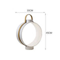 White metal Nordic minimalist table lamp 30x45cm on a desk