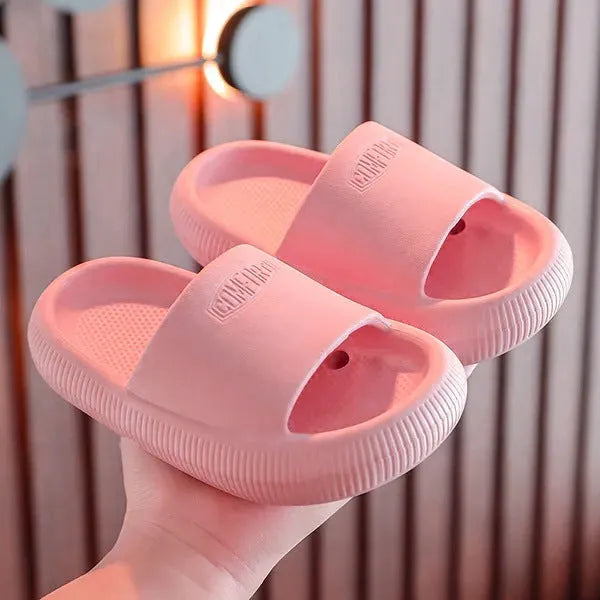 Mixed colour children's EVA slippers with a non-slip sole, shown in sizes for kids.