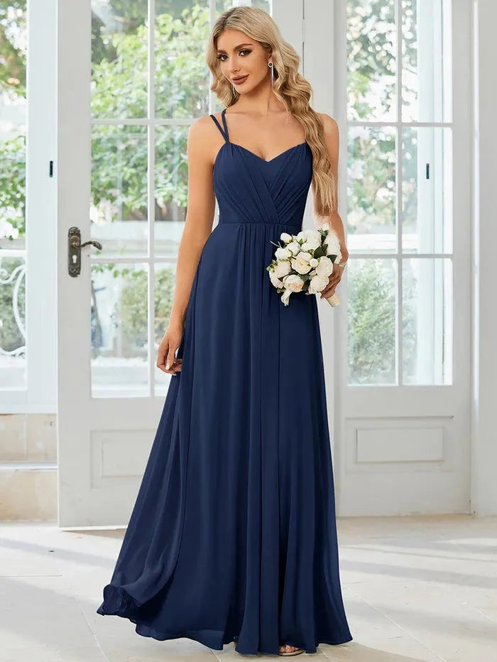 Women's long sleeveless A-line dress with pleated skirt in solid colour options