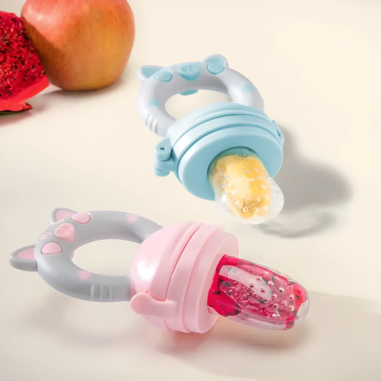 BPA-free silicone baby teether in blue, green, or pink colours showing single and triple mouthpiece design options