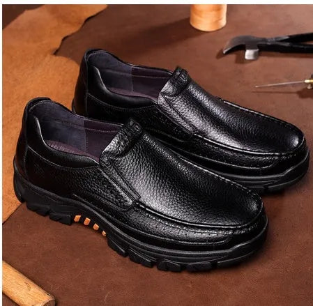 Black and brown business casual leather slip-on shoes with a soft sole and rubber outsole