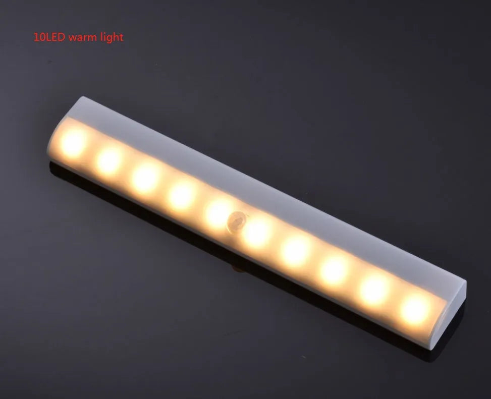 Silver aluminium LED strip light with magnetic backing for wardrobe and cupboard installation.