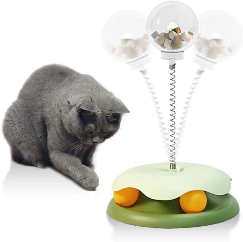 Blue cat treat dispenser toy with track ball showing slow feeder compartment