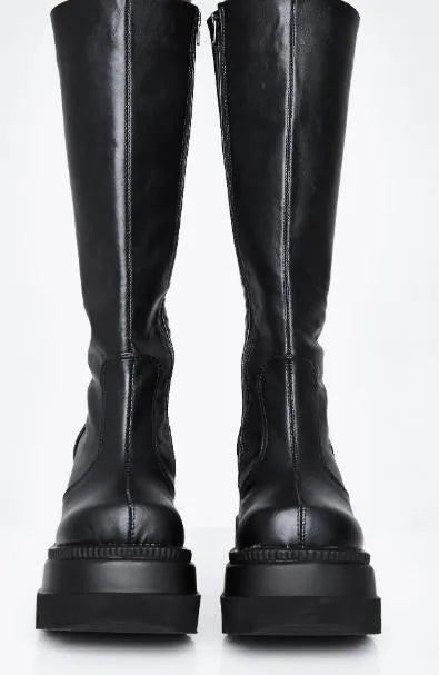 Women winter platform boots in black with front tie lace-up and genuine leather upper