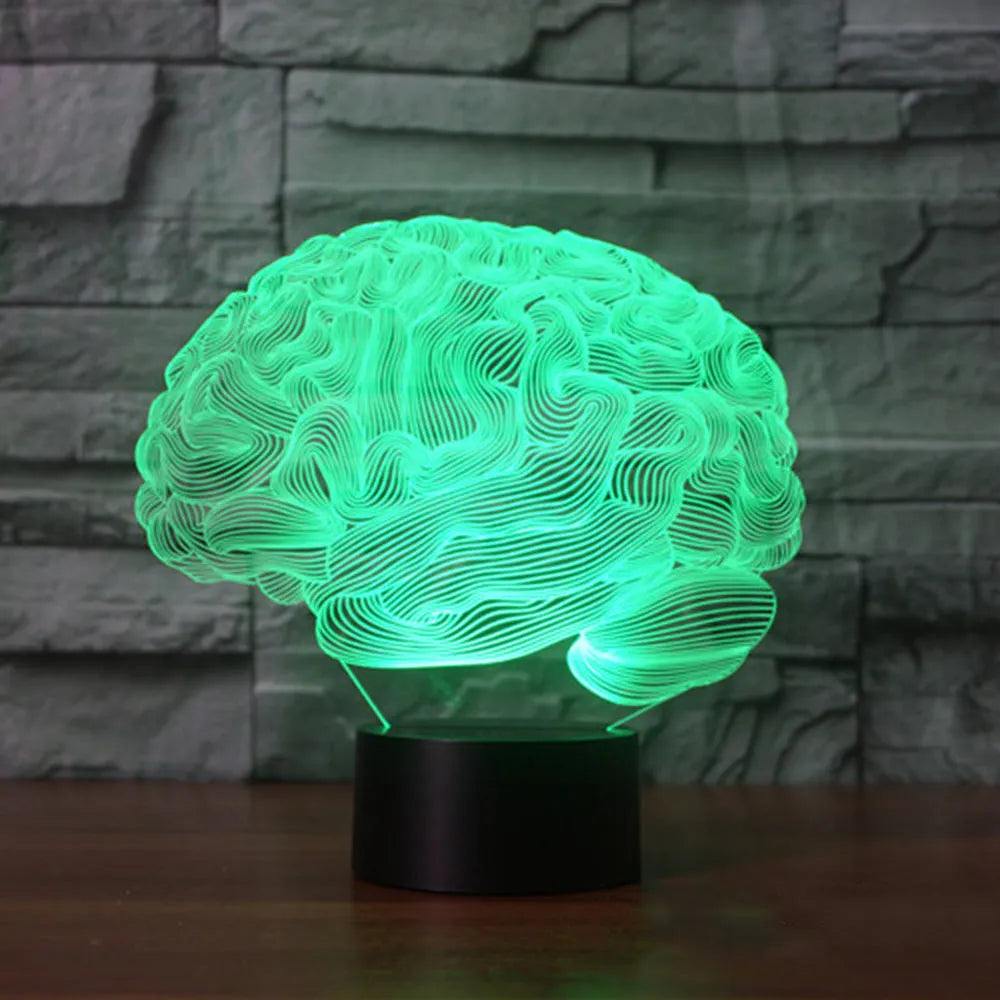 3D acrylic LED desk lamp showing colourful light projection with remote control on a wooden table.