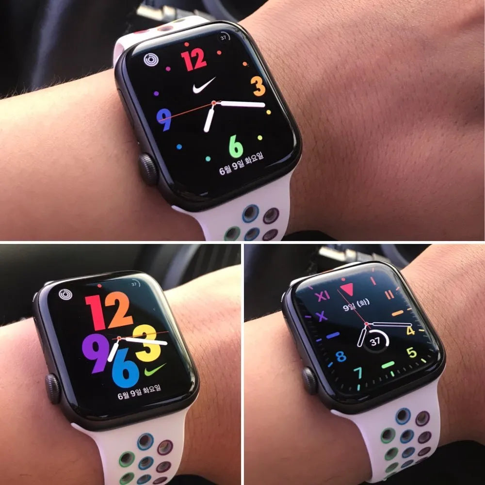 Silicone sports wristband with buckle closure in black, rainbow, or white colours