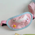 Pink and yellow messenger bag-style pet backpack carrier for small dogs and cats showing adjustable straps