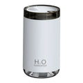 Jellyfish-shaped humidifier emitting smoke ring mist patterns with warm night light glow