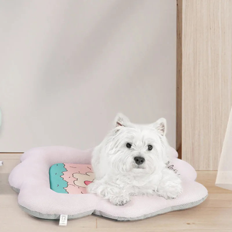 Green reversible pet cooling mat for dogs and cats showing soft fabric side and non-slip backing.