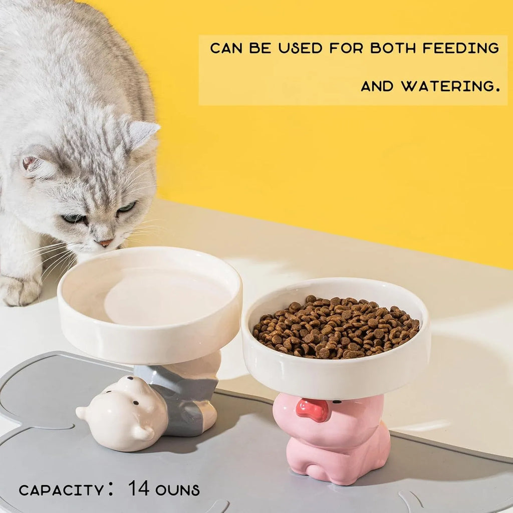 Ceramic raised cat bowl in animal theme design on a floor