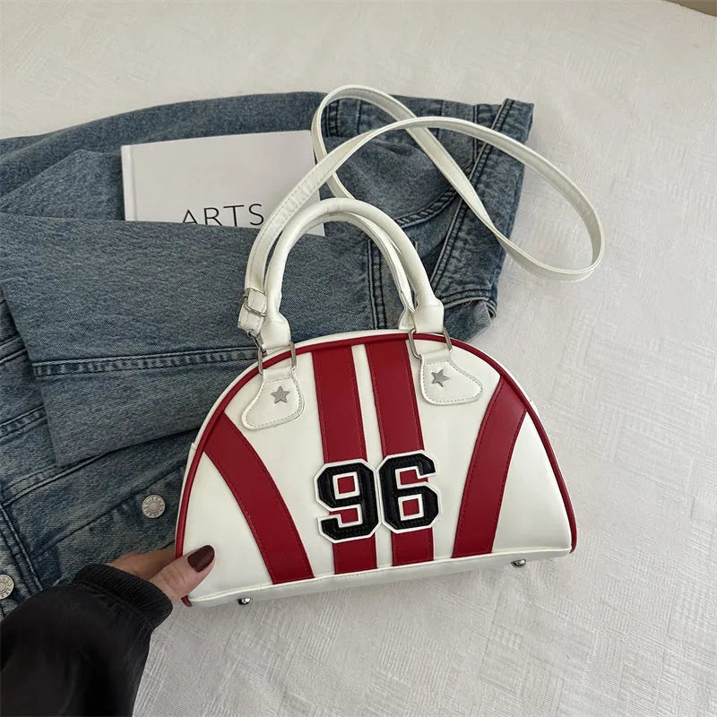 Colourful stripe contrast single shoulder bag in black with stitching and colour blocking details, PU material, dumpling shape