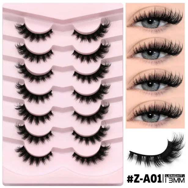 Box of natural false eyelashes with thick natural long style and adhesive tube