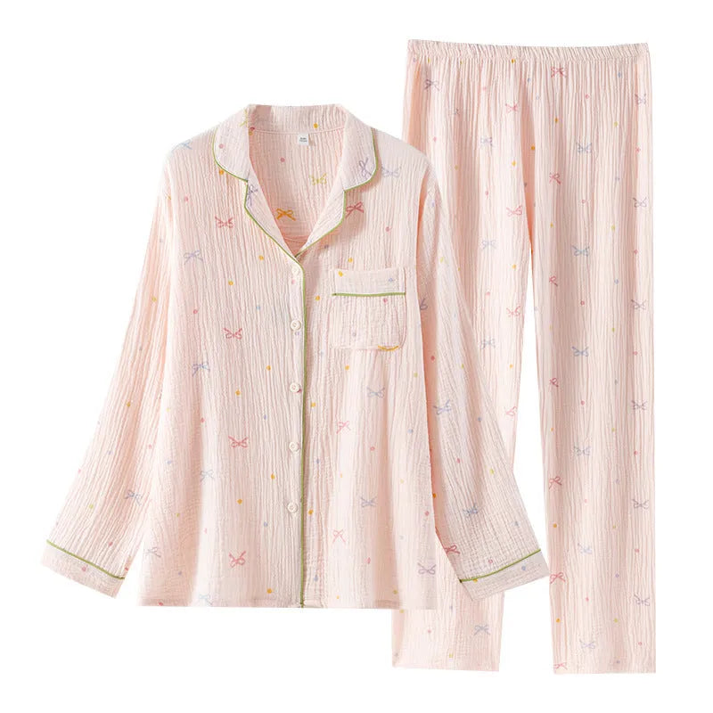 Women's beige thin cotton long-sleeved pajama top and trousers set laid flat