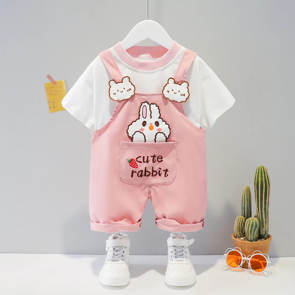 Baby wearing yellow cartoon short-sleeved overalls with adjustable straps