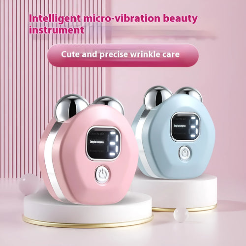 Portable white hot compress micro current facial massage instrument with double-roller head on a table.