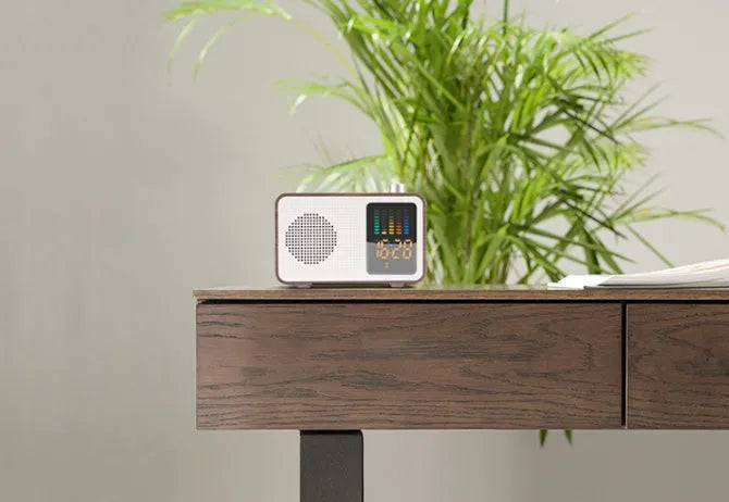 Brown woodgrain retro Bluetooth radio speaker with FM dials and carrying handle