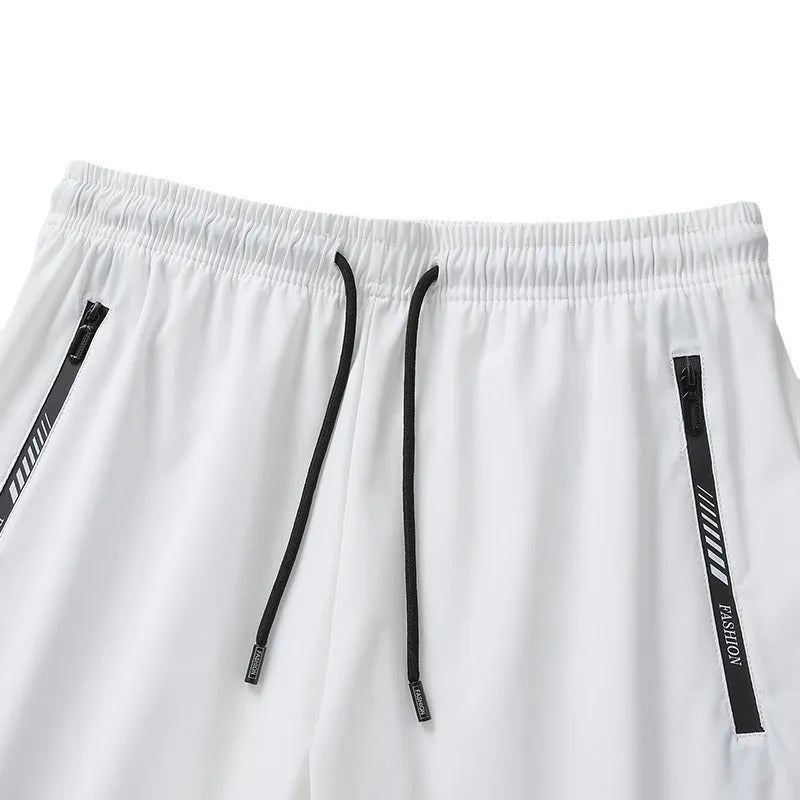 Men's quick-dry nylon sports shorts in loose fifth pants style