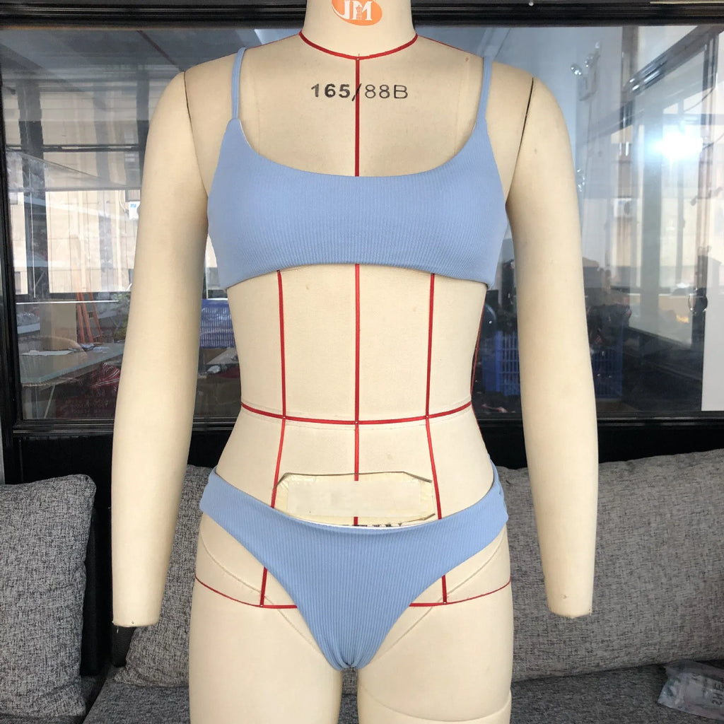 Blue striped bikini set with polyester and nylon fabric, two-piece swimwear on display