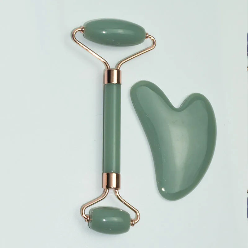 Stainless steel facial massage board set with heart-shaped design and scraping plate